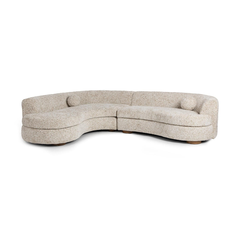 Classic Home Concord stationary sectional sofa with plush cushions and fabric upholstery, shown in a spacious living room setting.