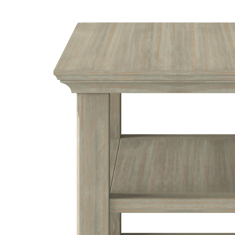 Handcrafted Acadian narrow side table by Simpli-Home, featuring a wooden surface and tapered legs in a natural finish.