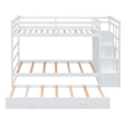 White DreamHaus twin over twin bunk bed with staircase and trundle, featuring a sturdy frame and convenient storage options.