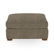 Classic Home Audrey upholstered ottoman with plush fabric, rectangular shape, and tufted top, perfect for living room decor.