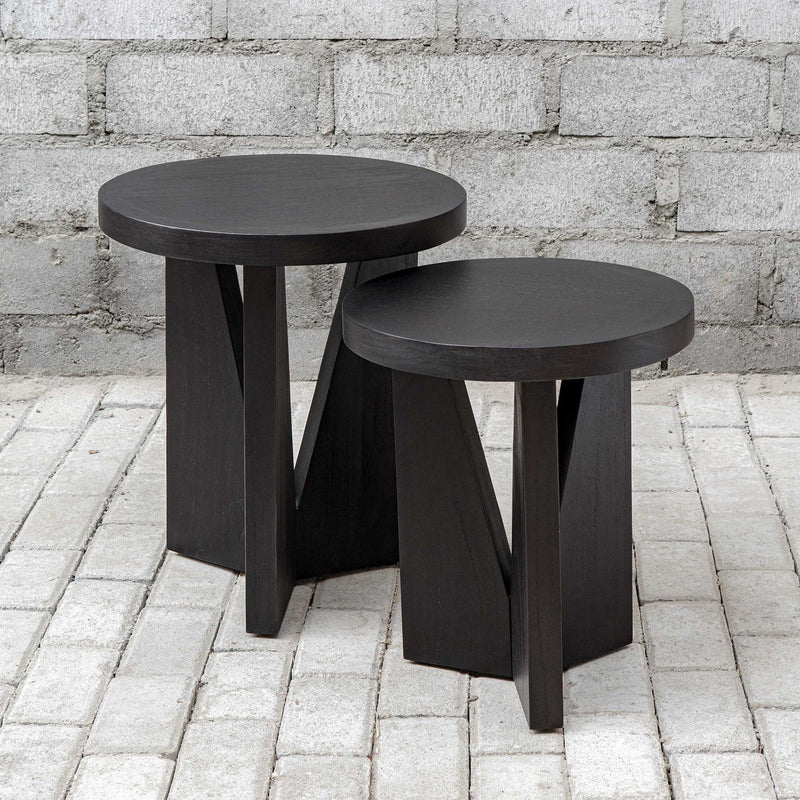 Uttermost Nadette nesting tables set of 2 with sleek wood surfaces and modern design, stacked together in a stylish living space.