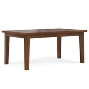 Simpli-Home Eastwood handcrafted dining table with wooden surface and sturdy legs, perfect for family meals and gatherings.