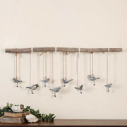 Light brown Birds on a Branch wall art by Uttermost, decorative wall decor with detailed bird and branch design.