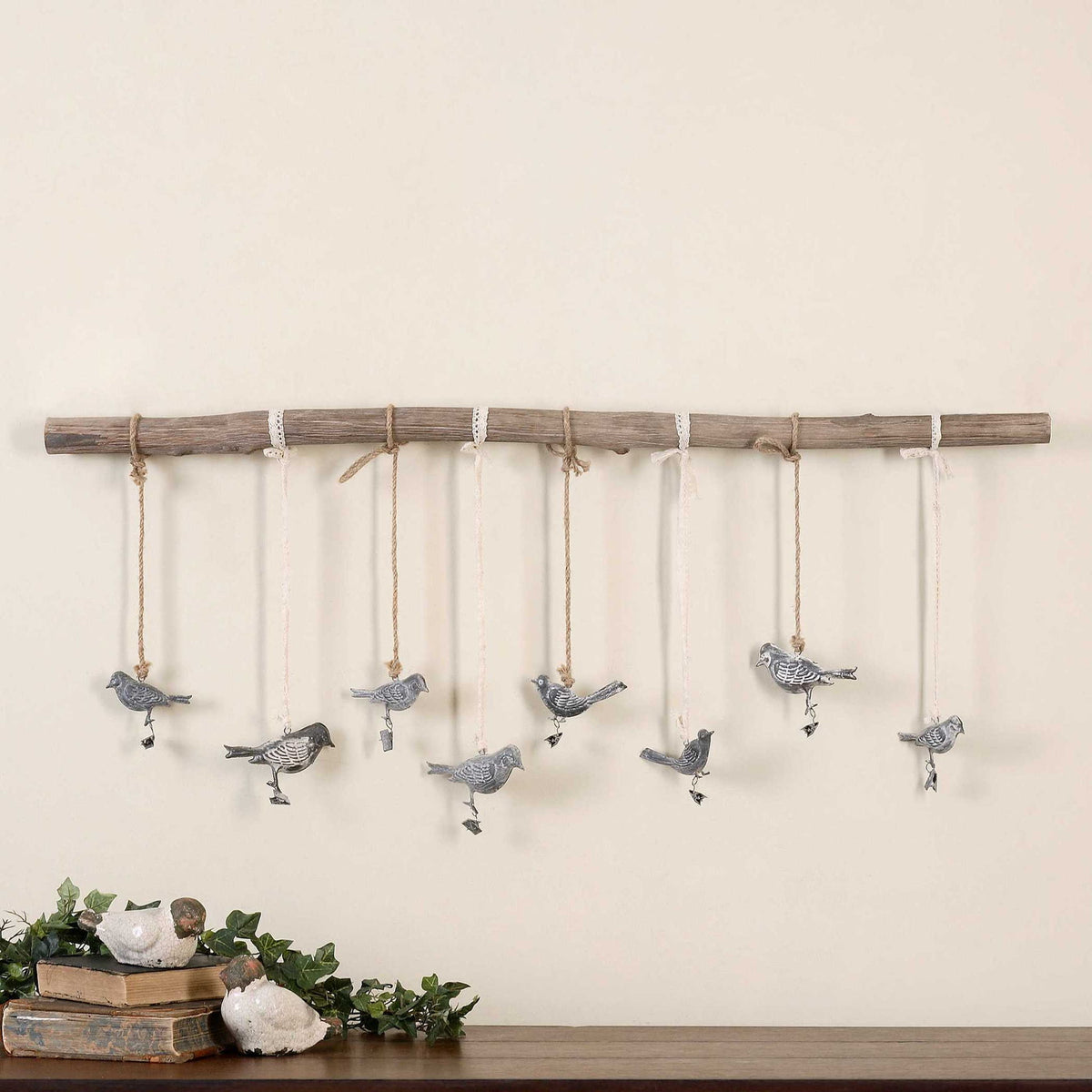 Light brown Birds on a Branch wall art by Uttermost, decorative wall decor with detailed bird and branch design.