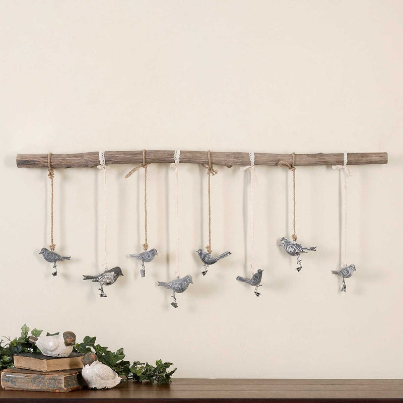 Light brown Birds on a Branch wall art by Uttermost, decorative wall decor with detailed bird and branch design.