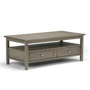 Handcrafted Warm Shaker coffee table by Simpli-Home featuring a polished wooden surface and sturdy legs.
