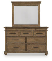 Signature Design by Ashley Karallin dresser with multiple drawers and modern wood finish, ideal for bedroom storage.