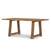 Simpli-Home Whitley dining table with wooden surface and sturdy legs, perfect for modern dining rooms.