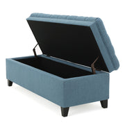 Noble House Juliana storage ottoman with birch wood legs, padded fabric top, and spacious interior for versatile home storage.