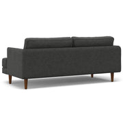 Livingston upholstered stationary sofa by Simpli-Home with plush fabric and cushioned armrests in a modern living room setting.