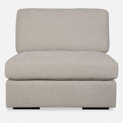 Uttermost Refuge armless stationary sofa with plush fabric and modern design, shown in a stylish living room setting.