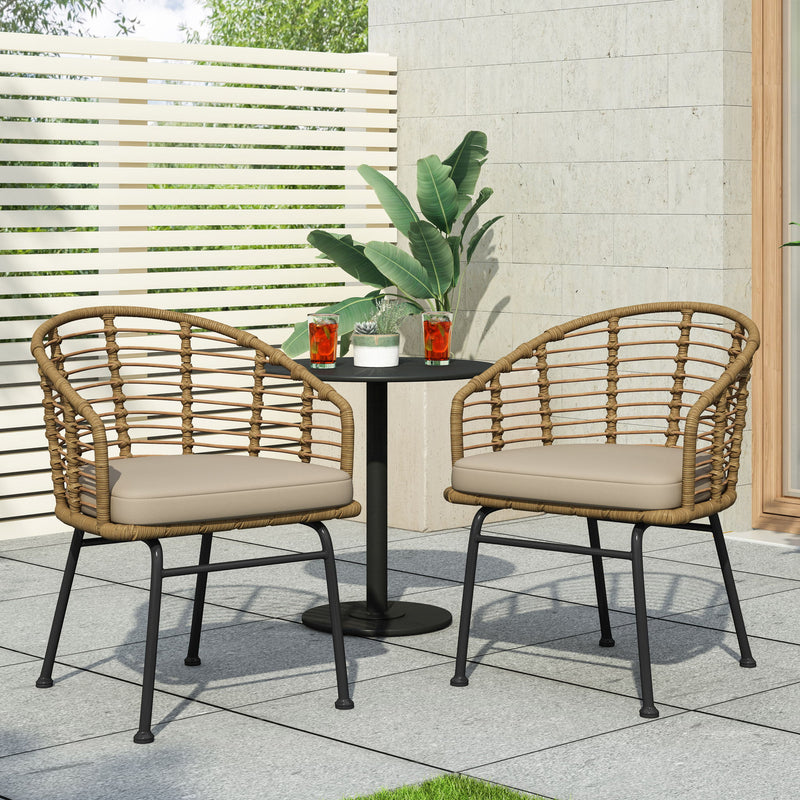 Noble House Randy modern wicker arm chair with water-resistant beige cushions and brown wicker frame for indoor or outdoor use.