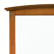 Elegant wall mirror by Glory Furniture with a sleek, modern frame, perfect for enhancing room decor and adding light.