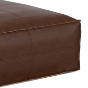 Large square Brody coffee table pouf by Simpli-Home, upholstered accent pouf with a soft fabric cover in a modern design.