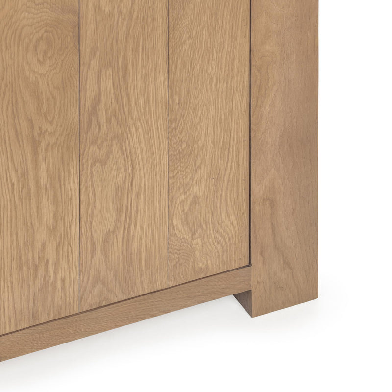 Classic Home Bristol 4-door buffet cabinet with wood finish, featuring sleek doors and ample storage space.