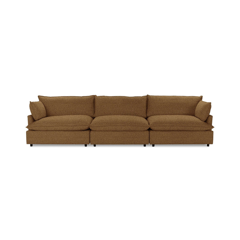 Classic Home Caplan modular sectional sofa with plush cushions and modern design, shown in a spacious living room setting.