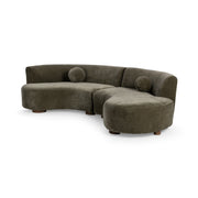 Classic Home Octavia stationary sectional sofa with beige fabric upholstery and plush cushions in a modern living room setting.