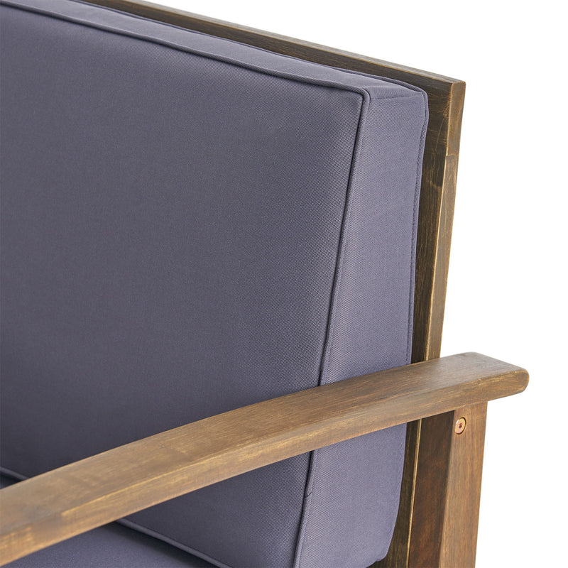 Dark gray Noble House outdoor club arm chair with slat panel design and water-resistant cushion for patio relaxation