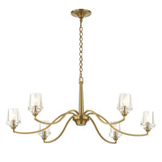 Uttermost Barcelona 6-light brass chandelier with gold finish, featuring elegant metal arms and classic design.