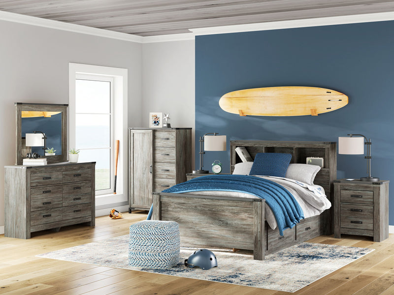 Signature Design by Ashley 7-piece bedroom set with bookcase panel, storage drawers, and matching furniture for a stylish bedroom.