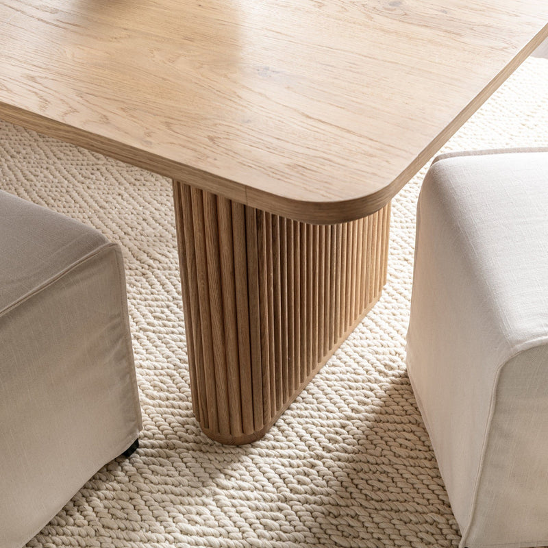 Classic Home Vander oak wood 84-inch dining table with sturdy legs and smooth tabletop, ideal for dining rooms and gatherings.