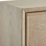 Uttermost Alessia 2-door accent cabinet in light brown wood with sleek modern design, featuring smooth surface and minimalist handles.