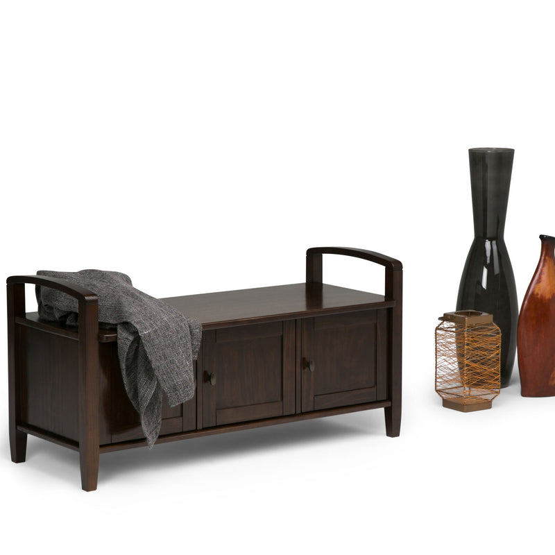 Handcrafted Warm Shaker entryway storage bench by Simpli-Home with wooden seat and open storage compartments.