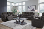 Benchcraft Brysonview reclining sofa and loveseat set in a modern living room with plush fabric and comfortable seating.