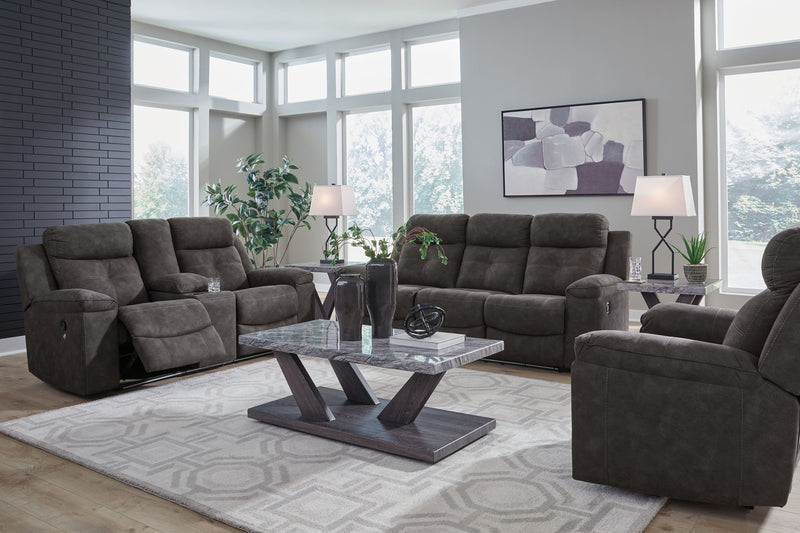 Benchcraft Brysonview reclining sofa and loveseat set in a modern living room with plush fabric and comfortable seating.