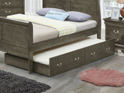 Elegant Glory Furniture trundle bed with classic design, featuring a wooden frame, storage drawer, and timeless charm.