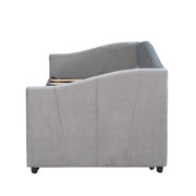 DreamHaus upholstered daybed sofa bed with wood slats and trundle bed, showcasing a stylish and functional trundle bed design.
