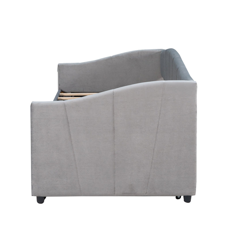 DreamHaus upholstered daybed sofa bed with wood slats and trundle bed, showcasing a stylish and functional trundle bed design.