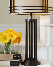 Hanswell - Metal Table Lamp  - Dark Brown - R&R Furniture Gallery (Fountain Valley, CA)