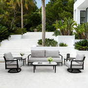 Life Outside 4-piece outdoor conversation set with chairs, bench sofa, tables, and Sunbrella cushions in a cozy patio scene.