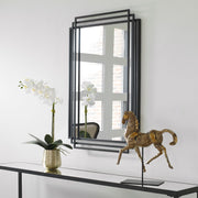 Uttermost Amherst wall mirror with a sleek, modern frame, perfect for contemporary home decor.