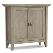 Redmond handcrafted wood accent cabinet by Simpli-Home featuring low storage and a rich red finish.
