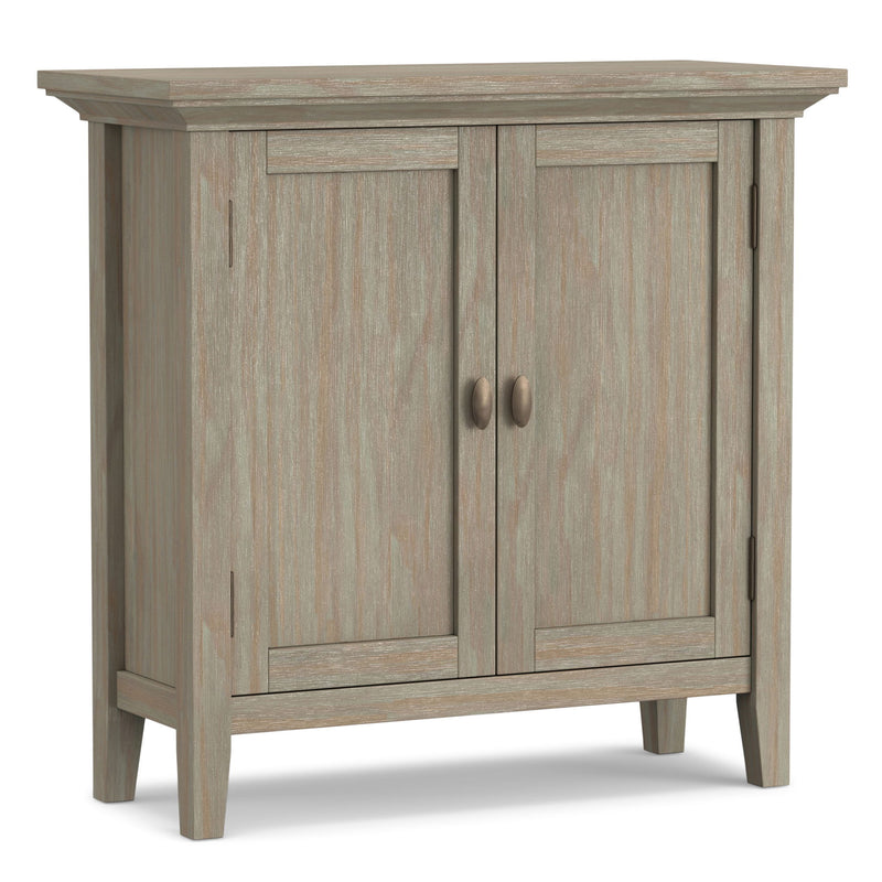 Redmond handcrafted wood accent cabinet by Simpli-Home featuring low storage and a rich red finish.