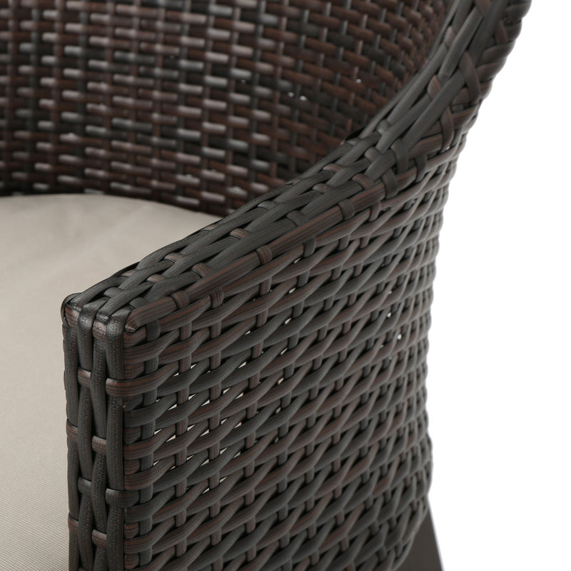 Set of two Noble House Hillhurst outdoor chairs with weather-resistant cushions, perfect for patio relaxation.