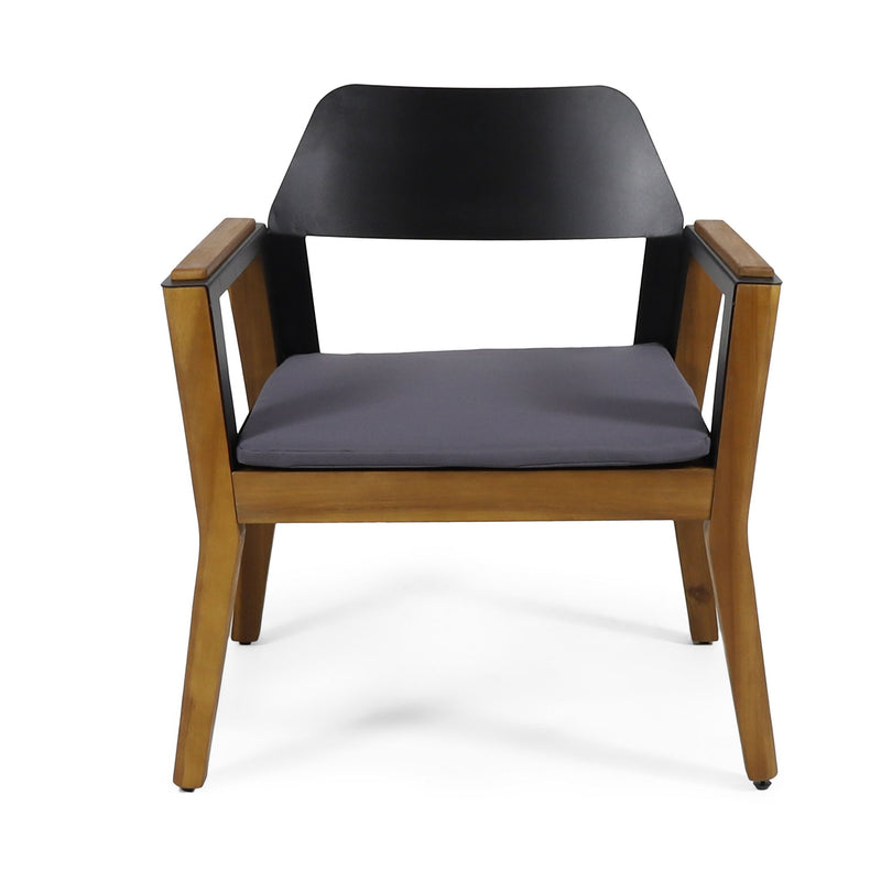 Set of two Noble House Soho outdoor club chairs with teak frames and cushions, perfect for transitional style patio seating.