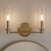 Regal - Double Light Vanity With Clear Ribbed Satin - Antique Brass / Clear - R&R Furniture Gallery (Fountain Valley, CA)