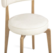 TOV Furniture Nikita dining side chair with sleek design, wooden legs, and upholstered seat for modern dining rooms