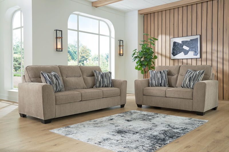 Benchcraft Olten living room set with stationary chair and ottoman, featuring plush fabric and modern design.