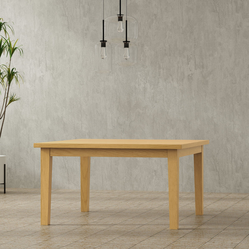 Eastwood handcrafted dining table by Simpli-Home, showing a spacious wooden table with a natural finish and sturdy legs.