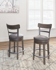 Caitbrook - UPH Swivel Barstool  - Gray - R&R Furniture Gallery (Fountain Valley, CA)