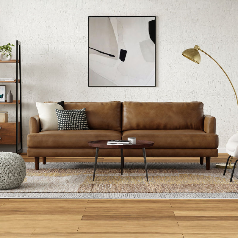 Livingston upholstered stationary sofa by Simpli-Home with plush fabric and cushioned armrests in a cozy living room setting.