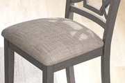 Gray Wrenning dining room table set with six chairs from Signature Design by Ashley, showcasing a stylish 6-piece dining furniture set.