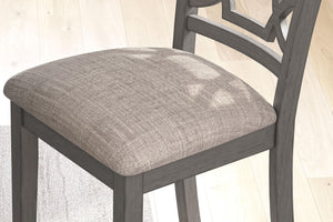 Gray Wrenning dining room table set with six chairs from Signature Design by Ashley, showcasing a stylish 6-piece dining furniture set.