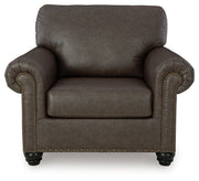 Benchcraft Roxmere living room set includes a stationary chair and matching ottoman in stylish fabric.
