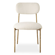 Set of two Capture dining chairs by Uttermost with gold frames and white upholstered seats, modern and elegant kitchen or dining room furniture