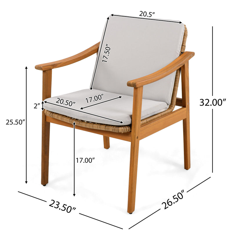 Set of two Noble House outdoor dining chairs with metal frames and woven rattan seats, suitable for patio or garden dining.